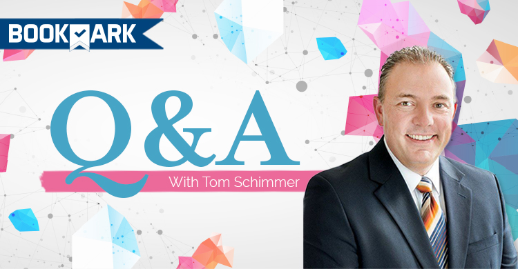 Image of Tom Schimmer on multicolored background