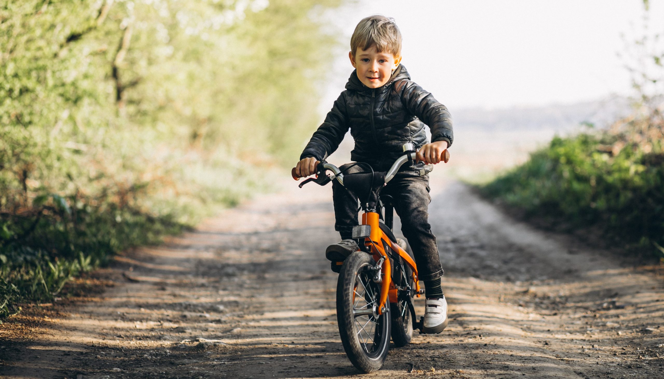 little boy on bike