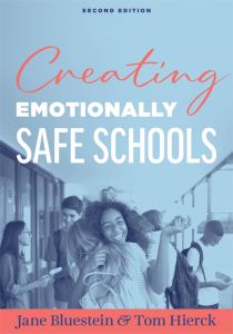 Creating Emotionally Safe Schools, Second Edition by Jane Bluestein and Tom Hierck; a group of students and two young girls in the front hugging in a school hallway.